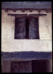View of a carbonized window of a house of the porch of the decumanus maximus, 5th century BC-1st century AD