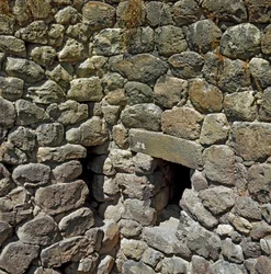Ruins of the nuragic city of the megalithic site of Su Nuraxi: the royal tower. 1100-1050 BC. Barumini, Sardinia, Italy