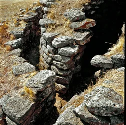 Nuragic culture: ruins of the nuragic city on the megalithic site of Losa: one of the defensive towers. Abbasanta, Sardinia, Italy