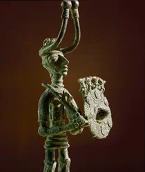 Statuette of a warrior with a shield and a bronze sword. 8th-7th century BC. Museo Nazionale Archeologico, Cagliari, Sardinia, Italy