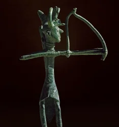 Statuette of warrior pulling a bronze bow. 8th-7th century BC. Museo Nazionale Archeologico, Cagliari, Sardinia, Italy
