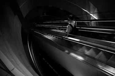 Solitary Escalator Ascent