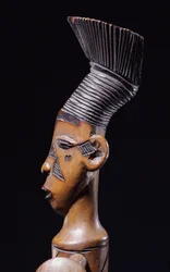(detail) of a fine Magbetu harp depicting the head finial in profile