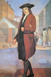 A young Ben arrives in Philadelphia, poor and hungry, with bread under his arm