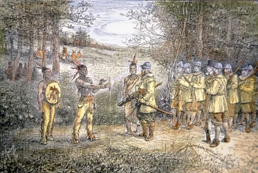 Captain Miles Standish trades with Wampanoag Indians in 1621