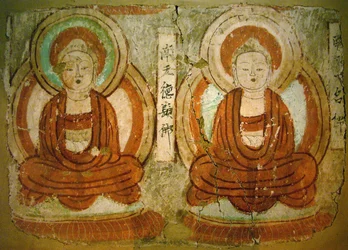 Buddhas painted from the 9th century to the period of Gaochang State, on a fragment of mural painting from the “Caves of Thousand Buddhas” in Bezeklik, Xinjiang Autonomous Region. Photography, Seoul National Museum, Republic of Korea, 2006.