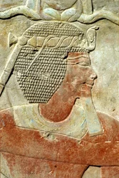 Ancient Egypt, Wall painting/carving, A Pharaoh, wearing the Atef crown, Karnak Temple, Luxor