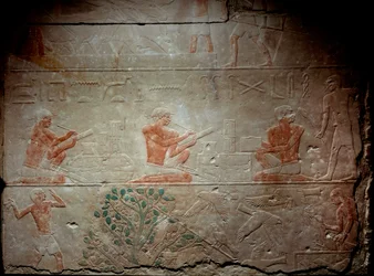 Ancient Egypt: limestone relief depicting scribes from the Chapel of Mastaba in Akhethetep, around 2300 BC. 5th dynasty. Old empire. From Saqqara (Sakkara). Paris, Louvre Museum