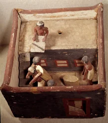 Egyptian Antiquities: Attic Model with Scribes Recording the Price of Grain. Made in painted wood. 12th dynasty, Middle Empire. Louvre Museum, Paris