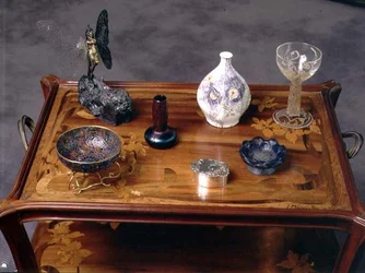 Loetz iridescent glass vase, a pate-de-verre bow by Argy Rousseau and a glass with moulded and etched decoration by Lalique