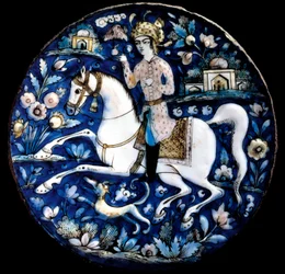 Iranian art: polychrome ceramic dish representing a horse rider