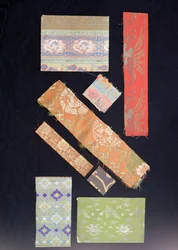 Fragments of fabric used for obi sashes, kimonos, No costumes and Kesa costumes for priests