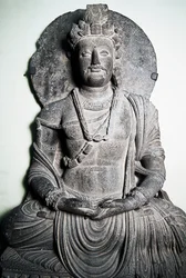 Stone sculpture depicting Buddha, Gandhara art, Peshawar, Pakistan