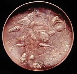 Plate depicting a royal soldier hunting lions, 6th-7th century
