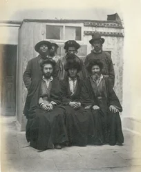 Group of 7 Polish Jews in the Courtyard of the Mediterranean Hotel, Jerusalem
