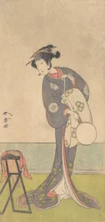 The First Nakamura Tomijuro as an Oiran Standing in a Room
