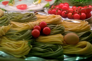 France, Paris: Pasta in display case on a public street