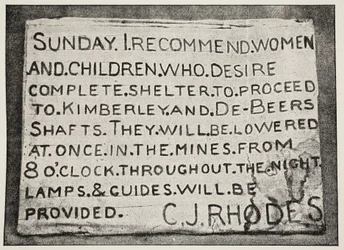 Placard erected by Mr Rhodes