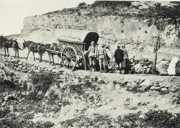 Unloading a cart of firearms, in order to climb the Dersa Hills, Tetouan, Morocco