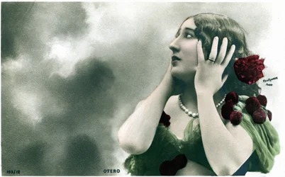 Beautiful Otero against a background of clouds, postcard early 20th century