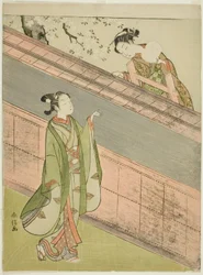 A Young Woman Returning a Ball to a Young Man