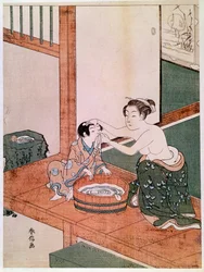 A naked mother washing her child in Japan beside a basin filled with water. Print by Suzuki Harunobu (1725-1770). 1766-1768. Dimensions: 0.27 x 0.201 m. Paris, Guimet Museum, National Museum of Asian Arts