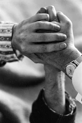 Hands of a patient and doctor during LSD treatment