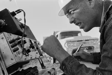 Mineralogist studies data at Morenci mine for Phelps Dodge Smelter Douglas Arizona