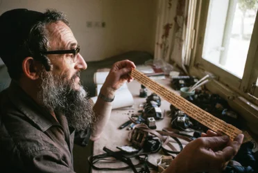 Scribe checks a Tefillin