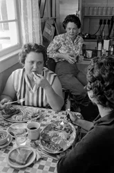 Women chat over breakfast in a diner in Oregon