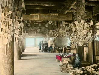 Rice Spoon Vendor in the Thousand Tatami Pavilion, Miyajima, circa 1900 - 1915