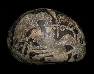 The Ica Stone. A Dinosaur Killing a Man