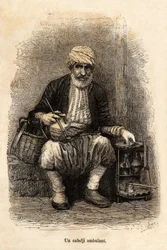 A travelling coffee seller (cafedji), in the bazaar of Trebizond, present-day Trabzon on the Black Sea coast, engraving after a drawing by the narrator, illustrating a journey to Lazistan and Armenia of 1869, by Théophile Deyrolle, published in “Le Tour