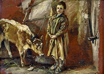 Boy with a tethered calf
