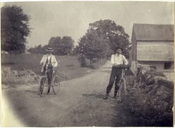 Samuel Murray and Benjamin Eakins on Bicycles, c. 1895-1899