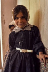 Young Iranian girl in dress and scarf