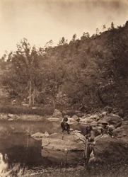 View on Apache Lake, Sierra Blanca Range, Arizona, with Two Apache Scouts in the Foreground