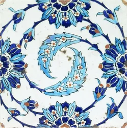 An Iznik Pottery Tile, with a Spiralling Floral Motif, Early 17th Century
