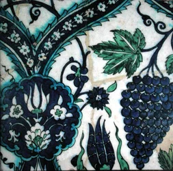 Isnik tile with flowers and a bunch of grapes