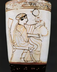 Lekythos, oil flask depicting woman weaving crown, 5th century B.C.