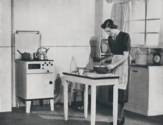 A British kitchen equipped with a cabinet gas cooker