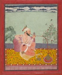 A Raja Smoking a Hookah