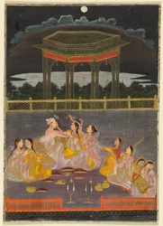 A prince celebrating Holi with palace women on a terrace at night