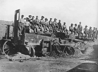 British Soldiers on a Wrecked Turkish Gun, 1915