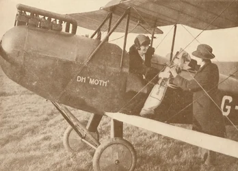 By Air to the Golf Links in a Little 27-60 HP Moth Light Plane