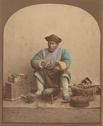 Chinese Man Sitting with Tools, 1870s
