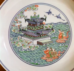 Chinese porcelain dish showing the Taoist triad, 18th century