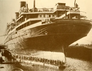 Cleaning the Hull of the Majestic in Dry Dock, c1930