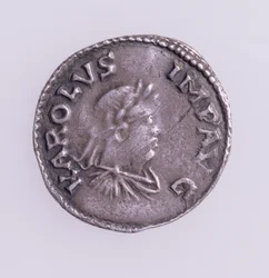 Denier of Charlemagne obverse showing a portrait of Charlemagne, Quentovic Mint 768-814