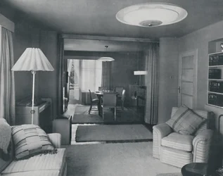 Dining and Living Room, Divided Only by Heavy Curtains in an Attractive Modern Weave